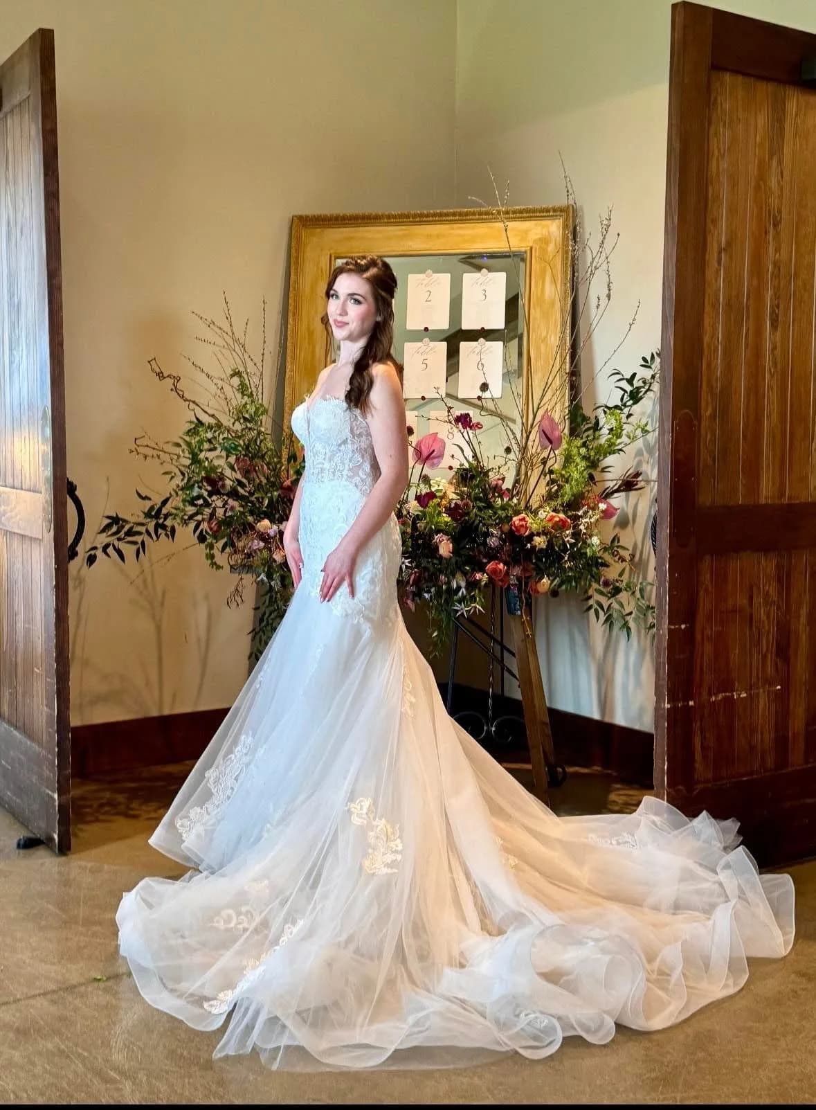 Bride in a lace mermaid wedding dress at Mayller Bridal boutique, Sinking Spring PA