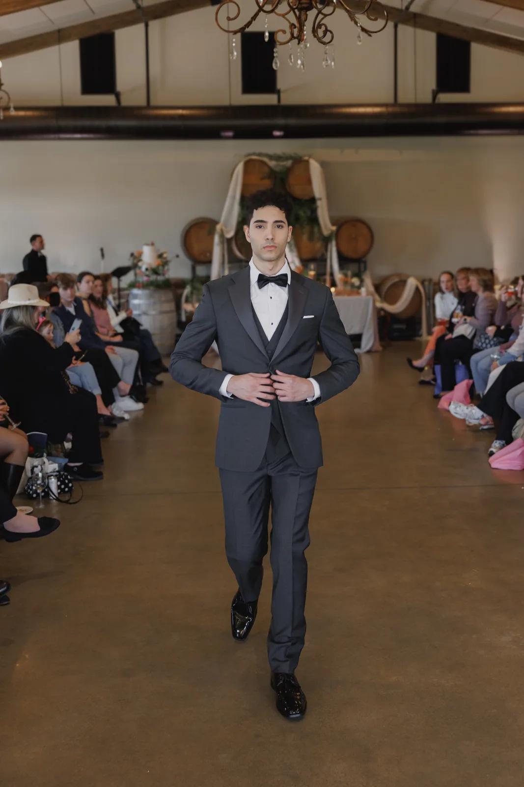 Groom tuxedo tailored by Mayller Bridal on the runway